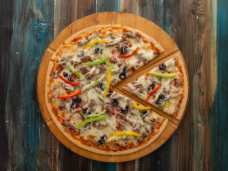 Vegetarian pizza with fresh toppings at Apache Pizza
